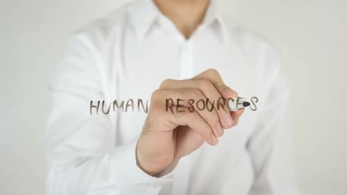 Man Writing Human Resources on Transparent Surface