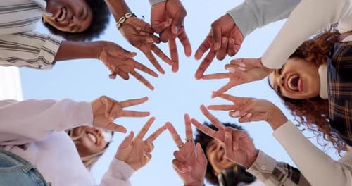 Students, star and hands with friends in college from below for support, education and future