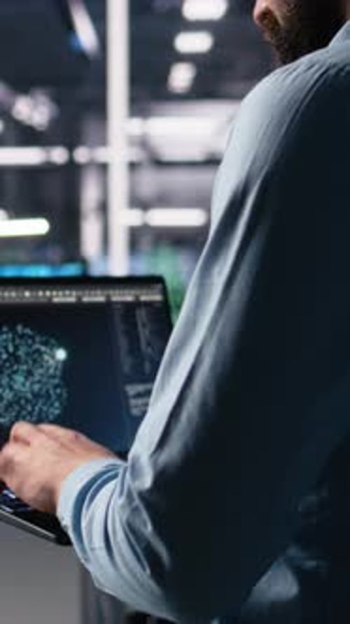 Vertical Video Data Center Programmer Using Laptop to Monitor Neural Network Using AI Chatbot