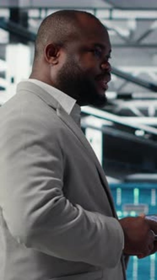 Vertical Video Cheerful Data Center System Administrator Reviews Code for Automation Scripts