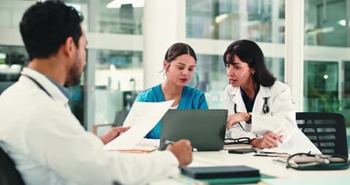 Medical Professionals Meeting in Bright Modern Hospital Office