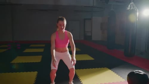 Athletic Woman in Gym Focused and Determined
