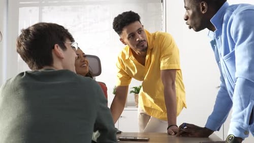 Startup Founders Discussing Business Strategy in Office Meeting