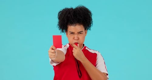 Whistle, red card and female referee in a studio with rules for a football match