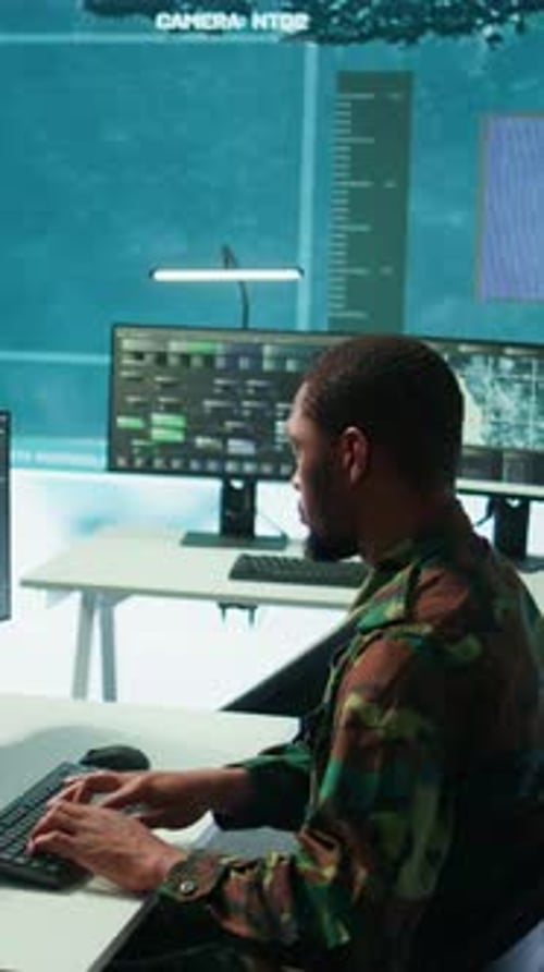 Vertical Video Soldier Working with AI Intelligence on Pc in Control Room