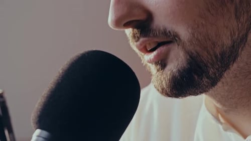 Podcast Recording Close Up Shot Bearded Guy Saying to Microphone in His Private Audio Studio