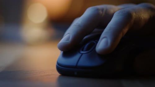 Close-up Macro Shot: Person's Hand Using Wireless Computer Mouse, Scrolls through Apps and Websites