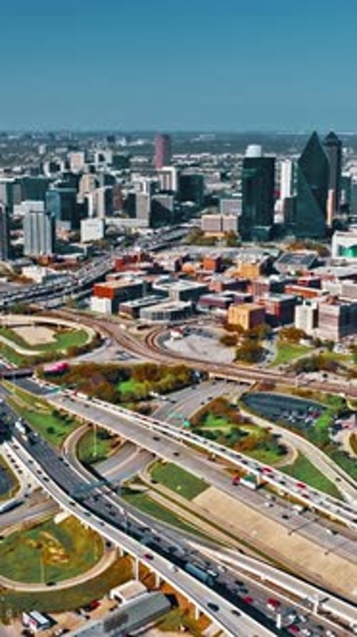 Urban landscape of Dallas showcasing traffic and city skyline