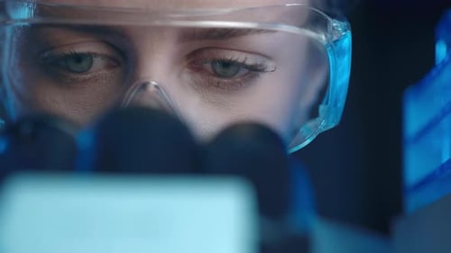 Woman Scientist Focused on Research in Laboratory