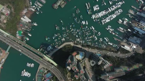 Aerial view of Aberdeen bay, Hong Kong, marina and Typhoon shelter with hundreds of small boats on a