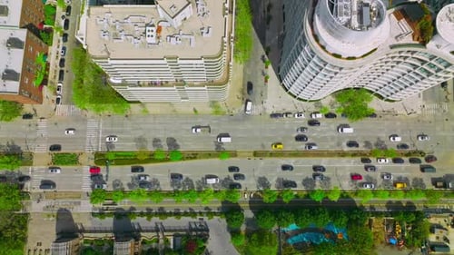 Numerous cars driving along the busy roads. Crazy traffic of metropolis at daytime