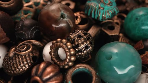 Close-up View of a Pile of Colorful Vintage Beads and Ornaments