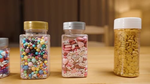 Assorted Colorful Sprinkles in Clear Containers