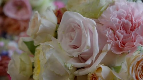 Detailed View of Single Tea Rose in Bridal Bouquet