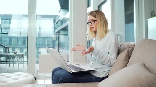 Woman Having Video Call on Laptop Indoors