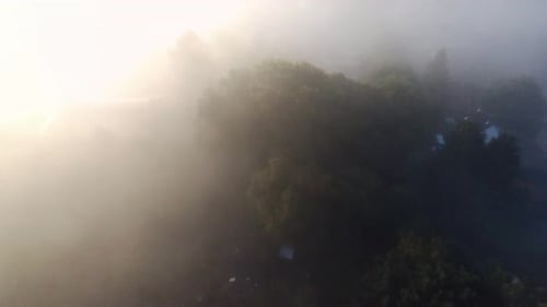 flying through the fog abov the clouds