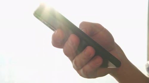 Man Hand Holding Cell Phone Touch Screen Typing Scroll Page Using App Smartphone Mobile Phone Device