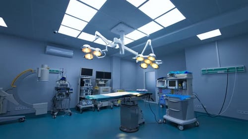 Approaching modern surgery table in the middle of surgical theatre.