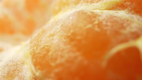An orange fruit without peel, Macro video. 4K