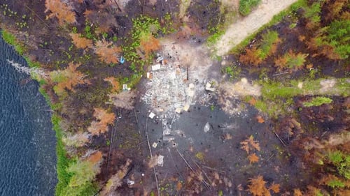 aerial overhead view of a home destroyed by wildfire
