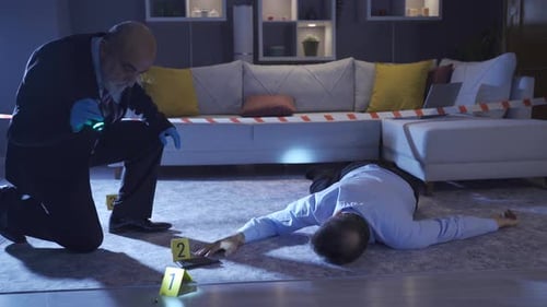 Adult Male Investigating Crime Scene in Home