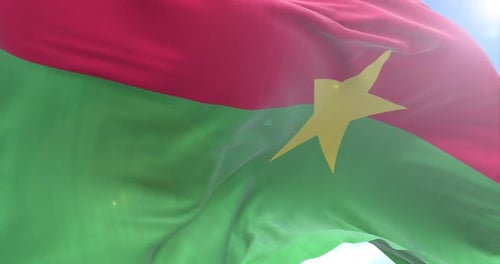 Burkina Faso Flag Waving And Rotating Camera 4K