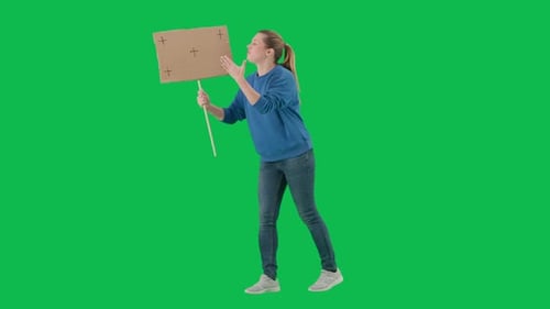 Female Activist Walking on Green Screen Shouting Protest Slogans Woman Holding an Empty Placard and