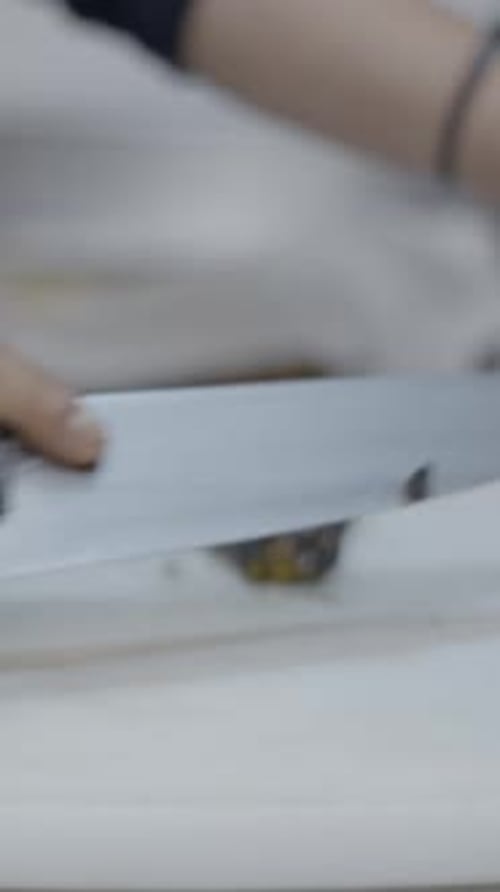 Unrecognizable Chef Cuts Vegetables on Cutting Board Close Side View
