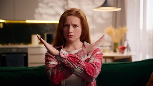 Serious Young Caucasian Woman Crossing Arms in Front of Chest Making Stop Gesture Girl Female