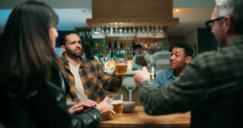 Night, cheers and friends with alcohol in pub, celebration or happy for reunion, group and together