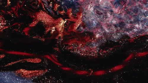 Swirling Black and Red Liquid with Glitter
