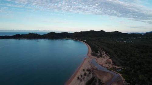 drone shot over horseshoe bay on Magnetic Island just before sunset, queensland australia