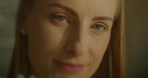 Close Up of Woman's Beautiful Face Indoors