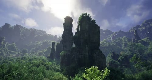 Majestic Rock Formations Rise Above Lush Greenery Under a Bright Sky