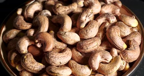 Close up of raw cashews in a bowl