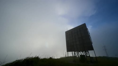 Abandoned antenna equipment at a radar station. Long exposure shot at night.