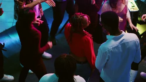 Multiple People Dancing at Nightclub