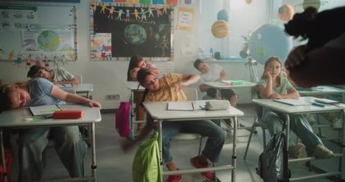 Female Teacher Conducting Funny Interactive Lesson to Primary School Children