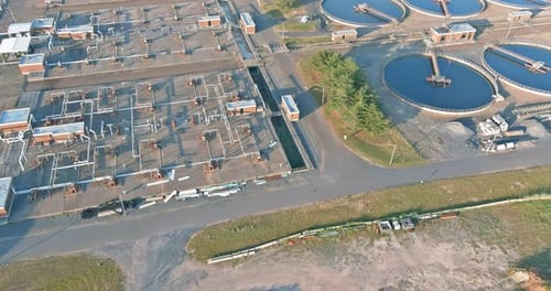 Aerial View on Sewage Treatment Facilities Aeration Water Purification Tanks in Modern Wastewater