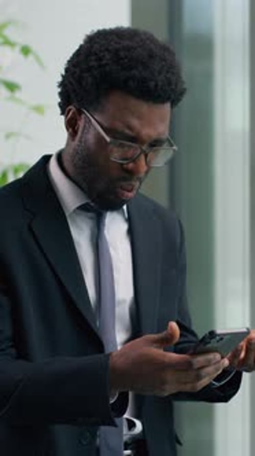 Shocked Confused Annoyed African American Male Guy Businessman Business Man in Office Looking