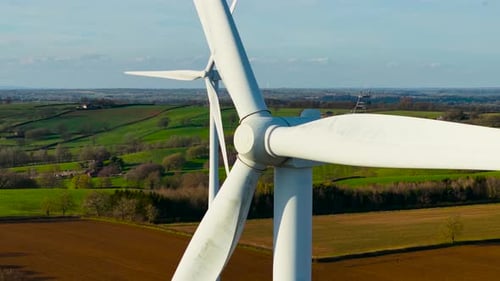Wind Farm and Green Electricity Production in Europe Wind Turbine Spinning Airflow Blades to Create