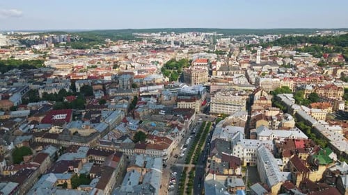 Amazing View of Old City in Ukraine Lviv Roofs Historical Buildings Architecture Drone Blue Sky and