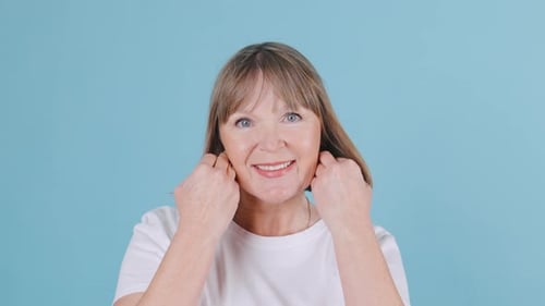 Woman Giving Herself a Facial Massage