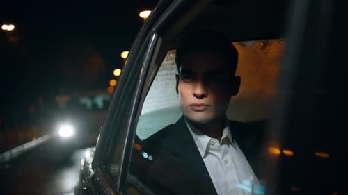 Rich Businessman Riding Car at Night Closeup Elegant Passenger Looking Outside