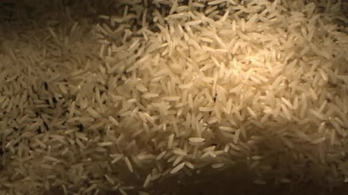 White Rice Flying In Slow Motion A Tabletop Food Shot