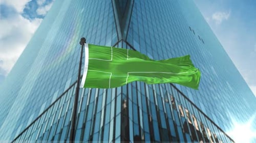 Waving Flag Animation Against Modern Skyscraper Background