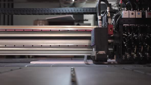 Large format high speed industrial printer for printing in slow motion ...