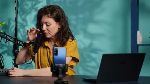 Woman Recording a Podcast with Audio Equipment