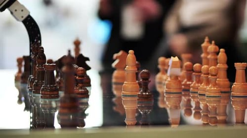 Robotic Arm Plays Chess on Reflective Chessboard