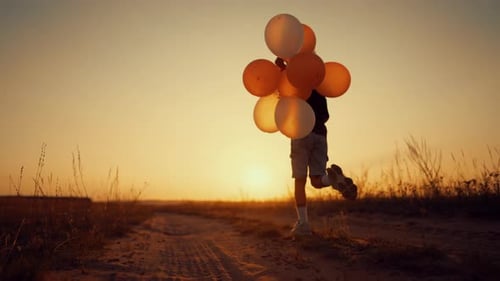 Child Runs with Balloons Toward Sunset in Field